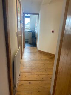 A cozy and inviting double bedroom with ample n...