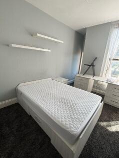 Bright and inviting double bedroom featuring a ...