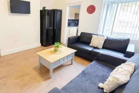 Bright and welcoming living room featuring two ...