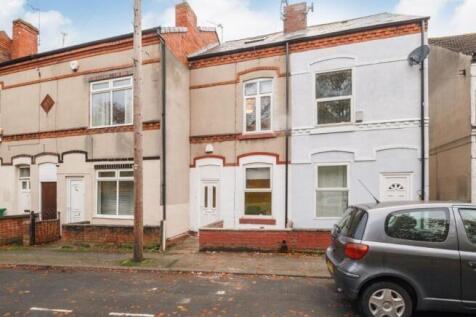 Charming terraced house with a neat façade and ...