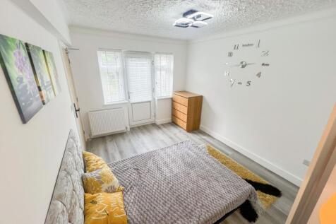Bright and inviting double bedroom featuring a ...
