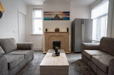 A modern and inviting living room featuring two...