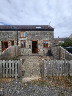 Charming stone-built terraced house with wooden...