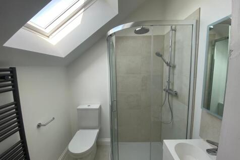 A modern, well-maintained bathroom featuring a ...
