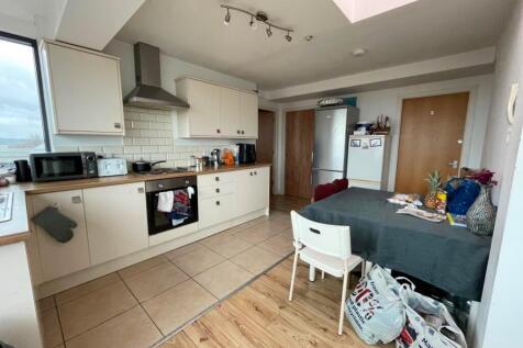 Bright and functional kitchen space featuring m...