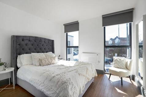 Bright and inviting double bedroom featuring a ...