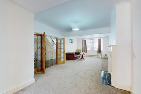 Spacious contemporary living room with neutral ...