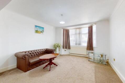 A bright and inviting living room with a large ...