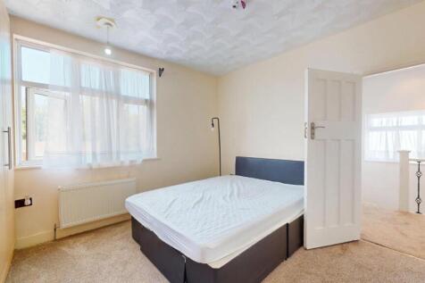 Bright and comfortable double bedroom featuring...
