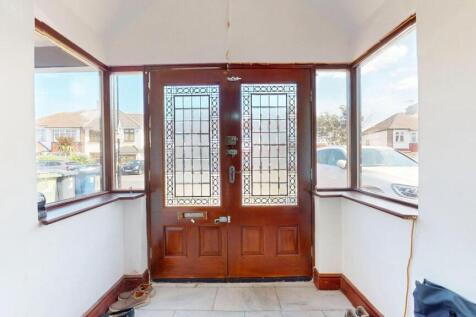 Bright and inviting hallway entrance featuring ...