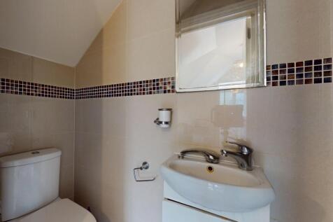 A clean and well-maintained single toilet featu...