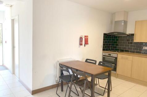 Bright and functional kitchen featuring a woode...