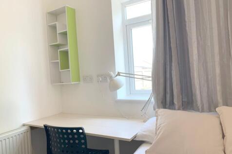 A bright and tidy single bedroom corner featuri...