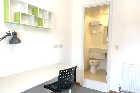 A bright, clean study area featuring a minimali...