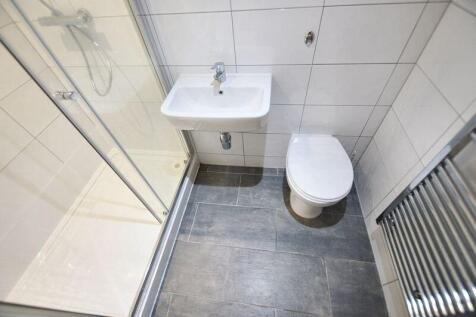 A modern, well-maintained bathroom featuring a ...