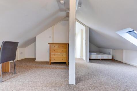 Bright and clean upper floor space with neutral...