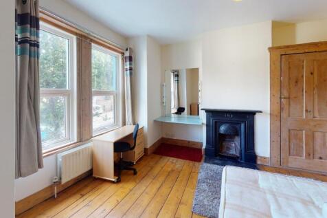 Bright and inviting master bedroom featuring a ...