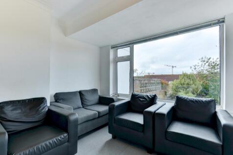 A modern living room featuring a set of comfort...