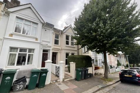A charming row of terraced houses on a quiet st...