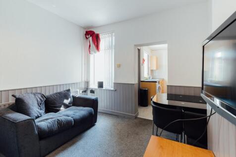 Bright and inviting living room featuring a com...