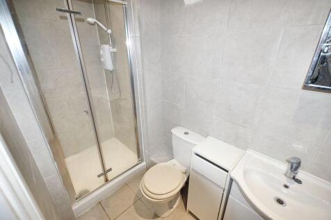A clean and well-maintained bathroom featuring ...