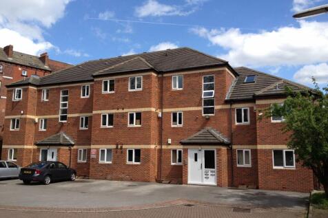 Bright and welcoming front exterior of a modern...