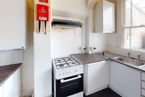 Bright kitchen with natural light from a large ...