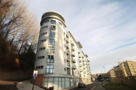 A modern multi-storey residential building with...