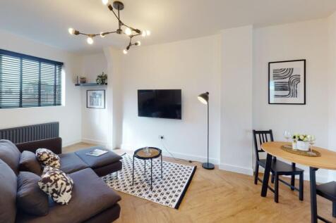 Modern and inviting living room with stylish bl...