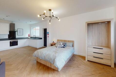 Bright and modern open-plan living area with a ...