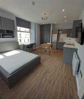 Bright and spacious master bedroom with modern ...