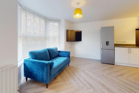 Bright and inviting living room featuring a vib...