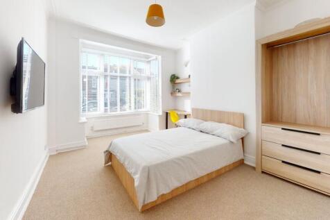 Bright and inviting single bedroom featuring a ...