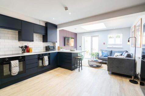 Bright and spacious living area featuring a com...