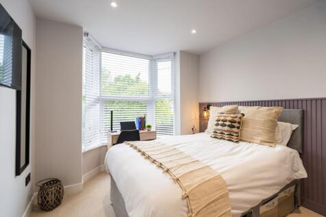 Bright and inviting double bedroom featuring a ...