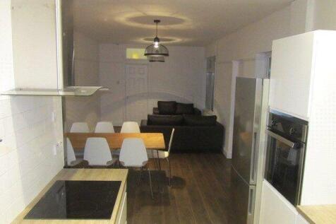 A contemporary open-plan living space featuring...