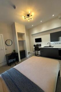A modern, well-lit living area featuring contem...