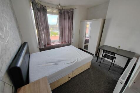 Bright and inviting double bedroom featuring a ...