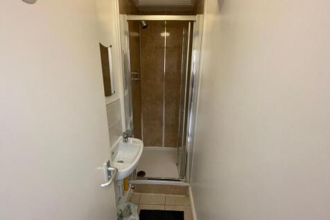 A clean and well-maintained bathroom featuring ...