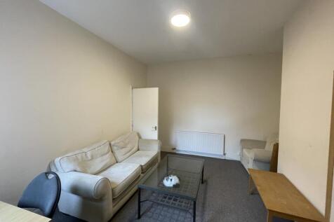 Spacious living room with comfortable seating, ...