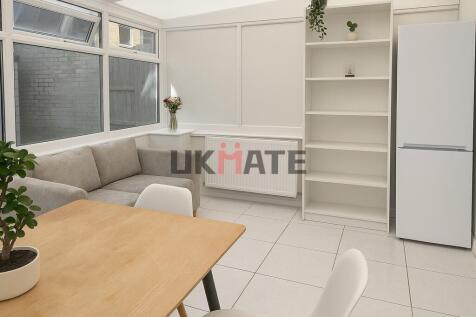 Bright and modern living room with large window...