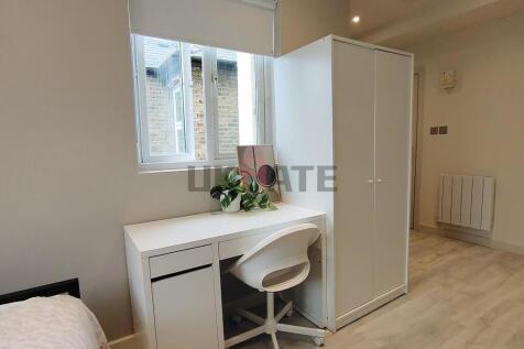 A bright and clean student accommodation room f...