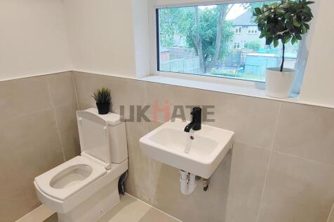 A bright and clean bathroom featuring a modern ...