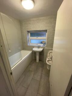 A modern and well-maintained bathroom featuring...