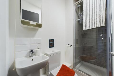 A modern, well-maintained bathroom featuring a ...