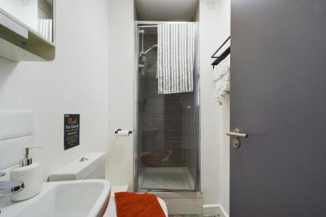 A clean and well-maintained bathroom with a mod...