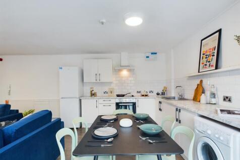 Bright and spacious modern kitchen with ample w...