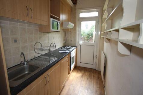 Bright and functional kitchen with ample storag...