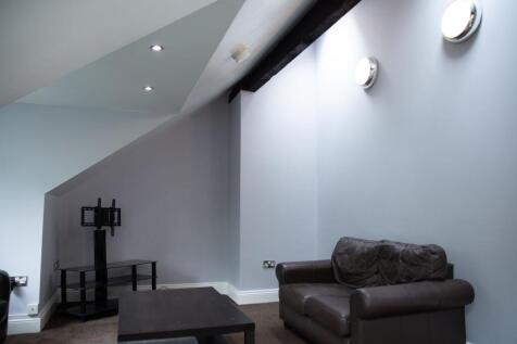Contemporary living room with a comfortable lea...