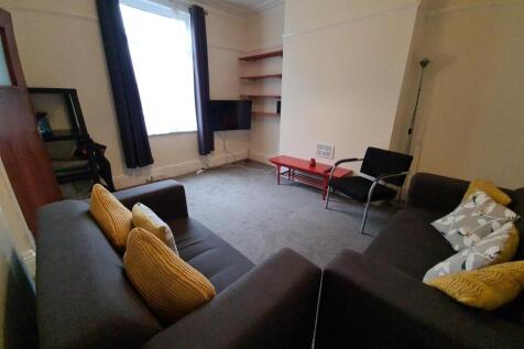 A welcoming and well-furnished living room feat...